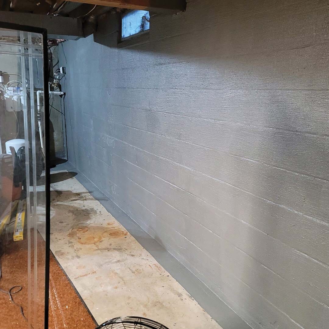 SEMCO Liquid Membrane applied as a water-based waterproofing membrane on a real interior basement wall